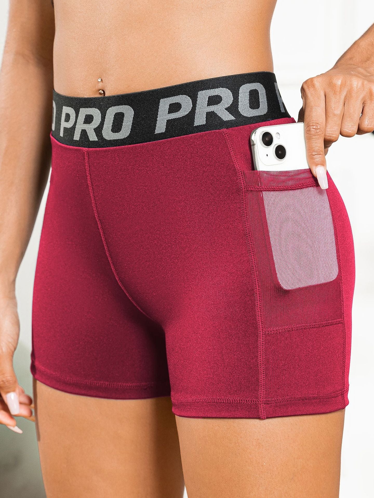Women's High-Waisted Butt-Lifting Yoga Pants with Mesh Pockets and Three-Quarter Length for Running and Fitness